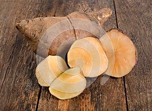 Yacon roots on wooden background