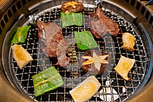 Yakiniku Japanese bbq with meat and vegetables cooking