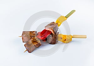 Yakitori Beef Skewers with bell pepper served with sauce isolated on white background
