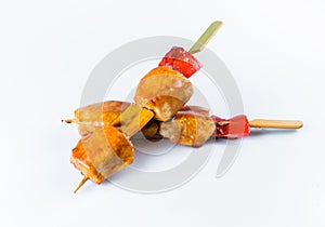 Yakitori Chicken Skewers with bell pepper served with sauce isolated on white background