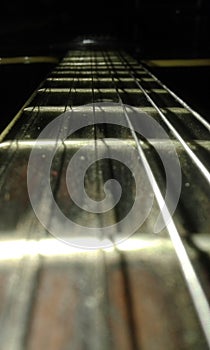 The Yamaha Guitar With The Light On The Darkness