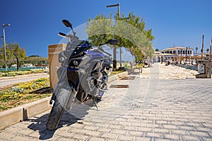 Yamaha MT 10 parked on promenade in city against sky during sunny day