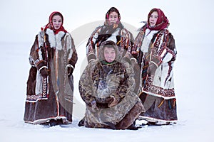 Yamalo-Nenets Autonomous Okrug, extreme north, Nenets family in the national winter clothes of the northern inhabitants of the