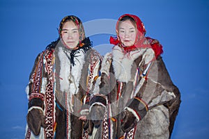 Yamalo-Nenets Autonomous Okrug, extreme north, Nenets family in the national winter clothes of the northern inhabitants of the
