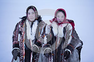 Yamalo-Nenets Autonomous Okrug, extreme north, Nenets family in the national winter clothes of the northern inhabitants of the