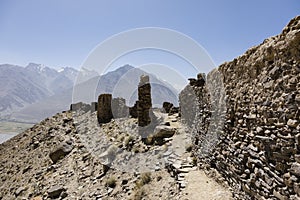 Yamchun Fortress in the Wakhan Valley near Vrang in Tajikistan. The mountains in the background are the Hindu Kush in Afghanistan