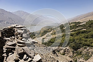 Yamchun Fortress in the Wakhan Valley near Vrang in Tajikistan. The mountains in the background are the Hindu Kush in Afghanistan
