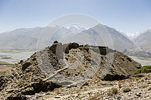 Yamchun Fortress in the Wakhan Valley near Vrang in Tajikistan. The mountains in the background are the Hindu Kush in Afghanistan