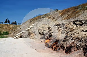 Yanar Dag burning mountain is a natural gas fire which blazes continuously on a hillside on the Absheron Peninsula, Caspian Sea