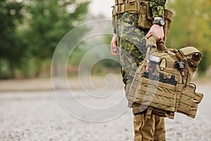 Yang soldier holding their equipment