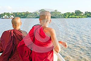 YANGON, MYANMAR - november 24, 2015: Young monks on the ferry