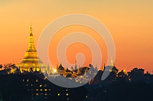 Yangon, Myanmar view of Shwedagon Pagoda at dusk.