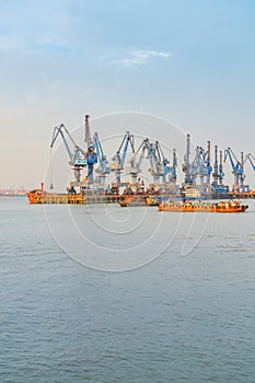 Yangtze River port wharf and and night view in Jiangyin City, Chinat photo