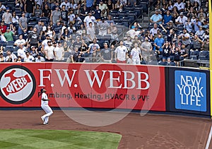 Yankees Right Fielder Watches Helplessly as Home Run Sails over the Fence in The Bronx