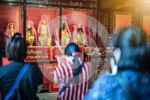 Yaowarat Bangkok, Thailand - 14 April, 2019: Chinese Thai people ward off bad luck or dispel bad luck at Chinese Dragon Temple
