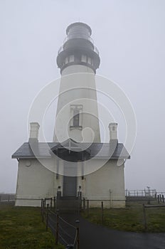 Yaquina Head Lighthouse in the fog. Oregon United States of America.