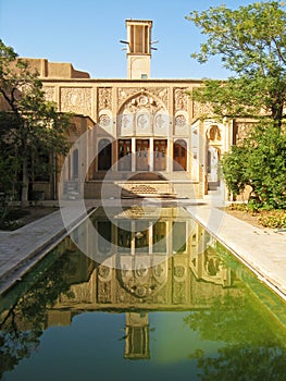 Yard of Borujerdi historical house and its pool in Kashan , Iran photo