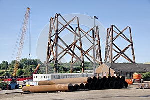 The Yard of an offshore wind turbine base construction site on the River Tyne