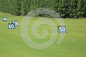 Yard signs in driving range