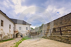 The yard of Stara Lubovna castle with wooden fence