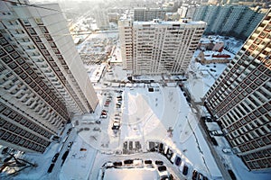 Yard with three dwelling houses, winter time