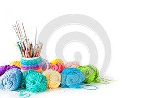 Yarn balls for knitting and hooks, knitting needles. photo