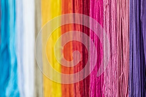 Yarn dyed thread or cord or packthread color hang on the wall for background usage.