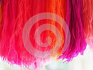 Yarn, Garn several colors arranged abstract Gradient for background, colorful pink orange red blue purple violet gold o-rose dark