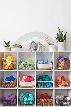 Yarn storage organization textile hobby supplies contemporary cupboard shelves. copy space