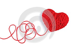 Yarn of wool in heart shape symbol