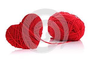 Yarn of wool in heart shape symbol