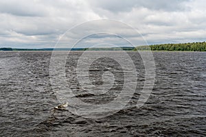 Yaroslavl region, Russia, July 10, 2023. River landscape in cloudy weather.