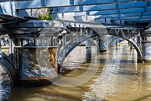 Yarra river flowing under Queens Bridge.