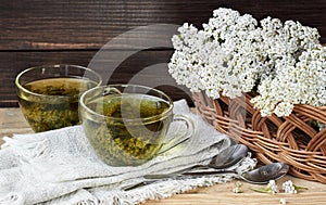 Yarrow herbal healing tea or decoction with fresh milfoil flowers