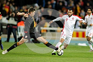 Yassine Chikhaoui vies with Fontas