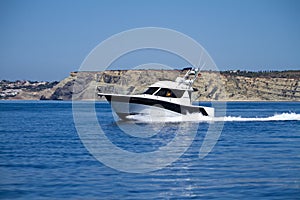 yatch speeding on the water