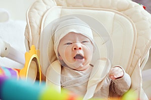 Yawning newborn baby