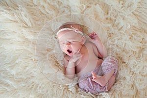 Yawning Newborn Baby Girl