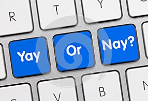 Yay or Nay? - Inscription on Blue Keyboard Key photo