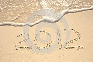 The Year 2012 Written in Sand on Beach