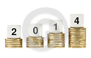 Year 2014 on Stacks of Gold Coins with White Background