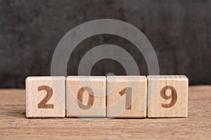 Year 2019 begin concept, simple and minimal cube wooden block bu