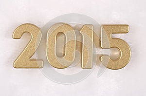 2015 year golden figures on a white