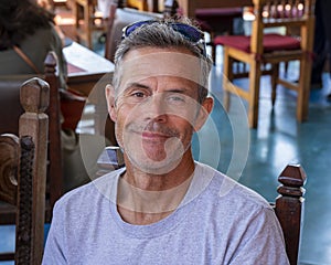 52 year-old Caucasian male tourist enjoying lunch on a patio in Todos Santo, Mexico. photo