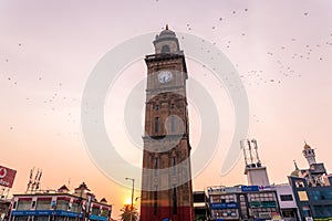 100 year old Clock Tower aka Dodda Gadiaya with numerals in Kannada language at Mysore, Karnataka, India