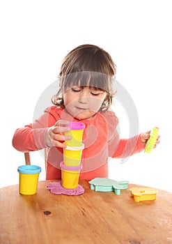 2 year old toddler stacking play doh pots photo