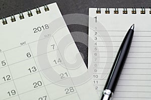 Year 2018 to do list concept by notepad with list number and pen