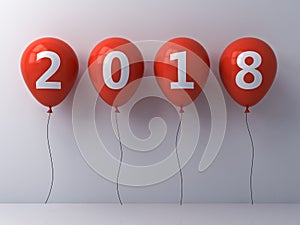 Year two thousand eighteen , Happy new year 2018 , White 2018 text on red balloons over white wall background