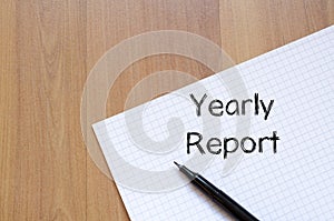 Yearly report write on notebook