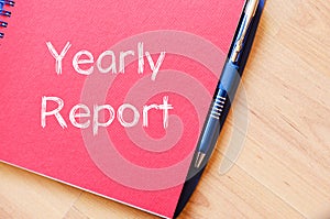 Yearly report write on notebook